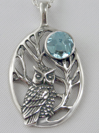 Sterling Silver Sacred Owl Pendant With Blue Topaz